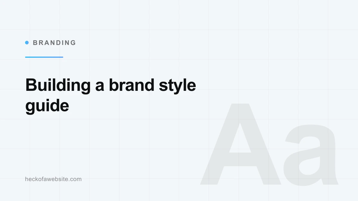 Open brand style guide book displaying color swatches and typography samples